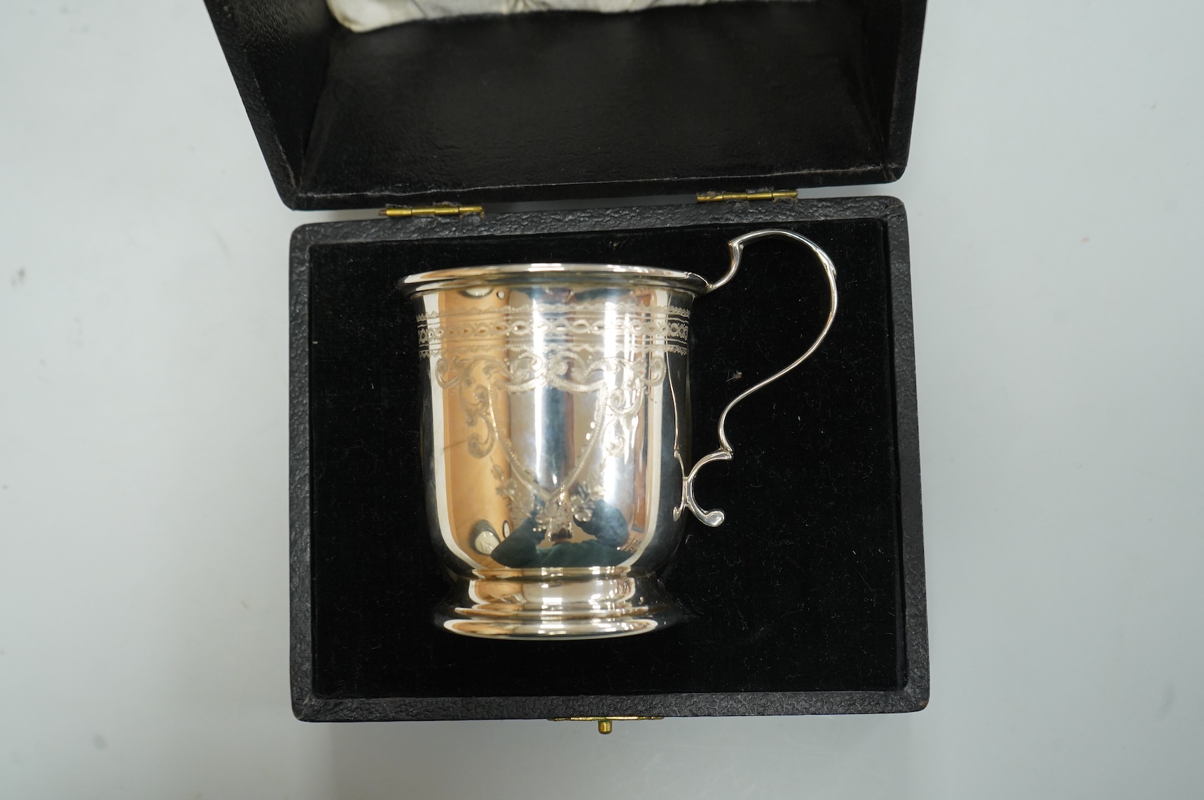 A George VI engraved silver christening mug, by Robert Pringle & Sons, London, 1936, 82mm, 2.8oz, in fitted case.